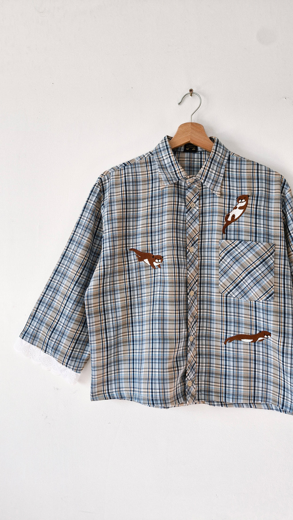 chemise bleu loutre de rivière